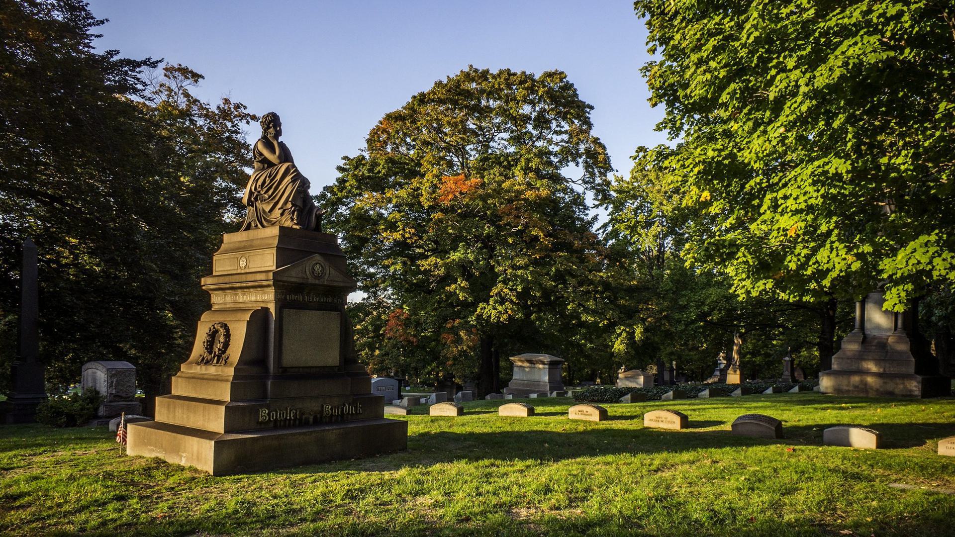 A view of a statue in a cemetary