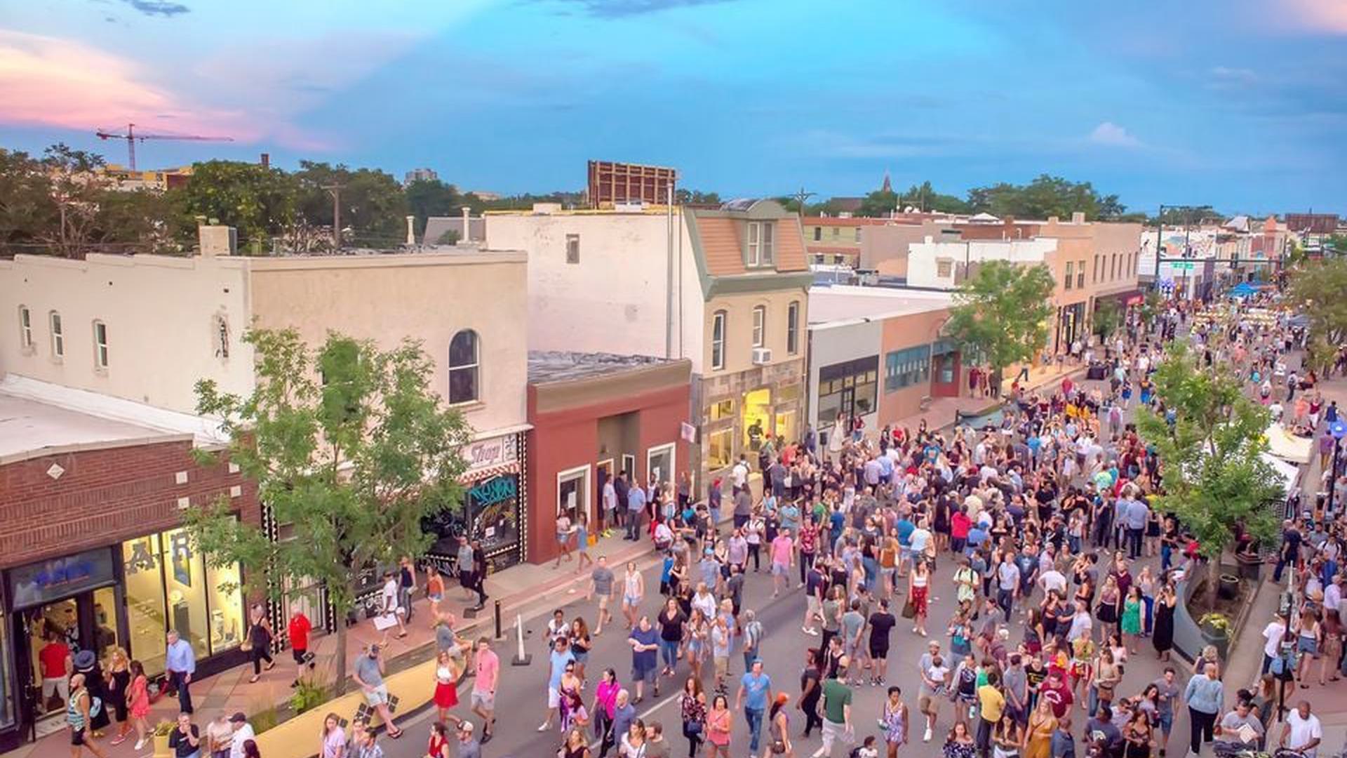 a crowd of people on the street
