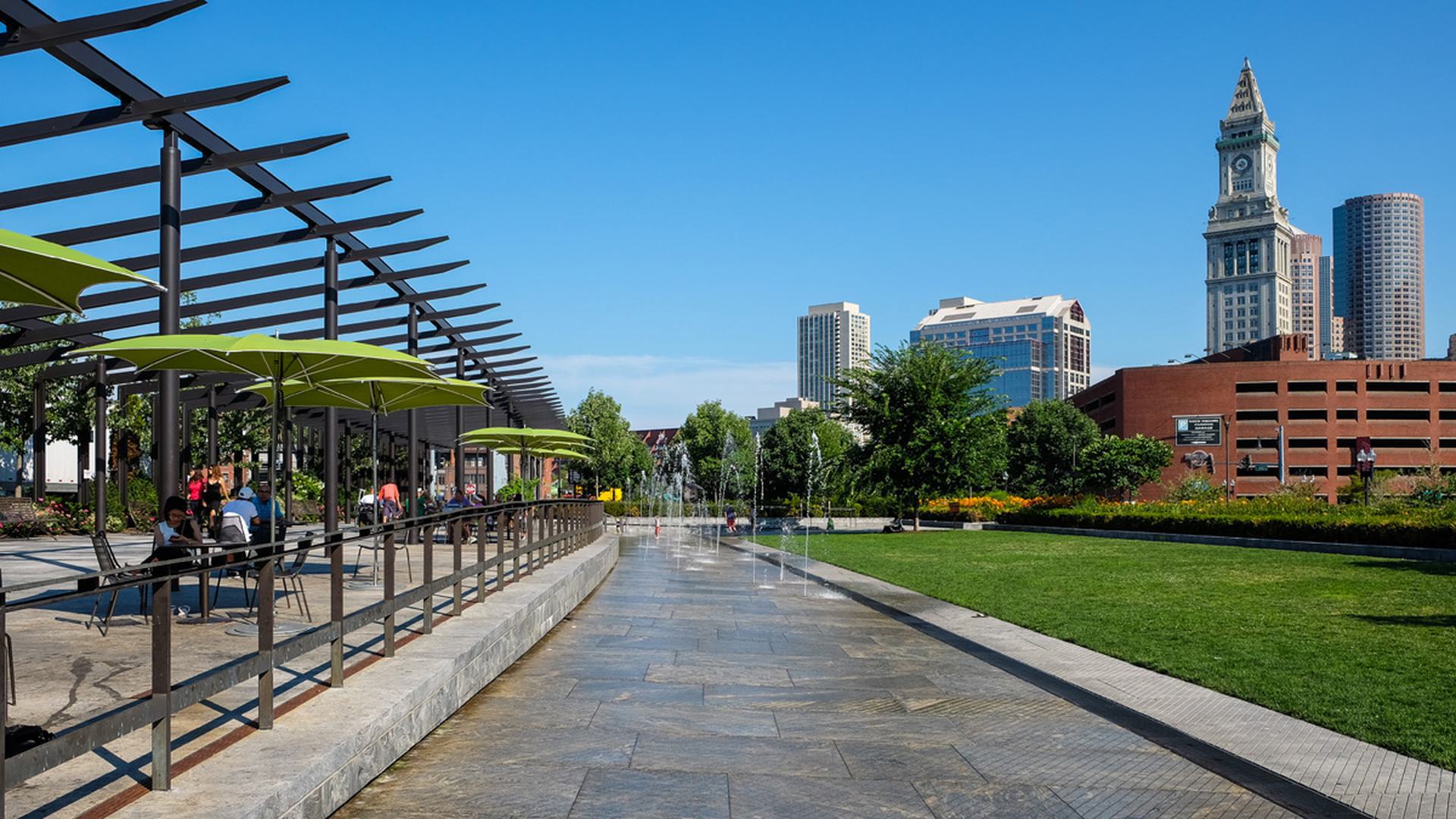 Walkway with water fountains in a park