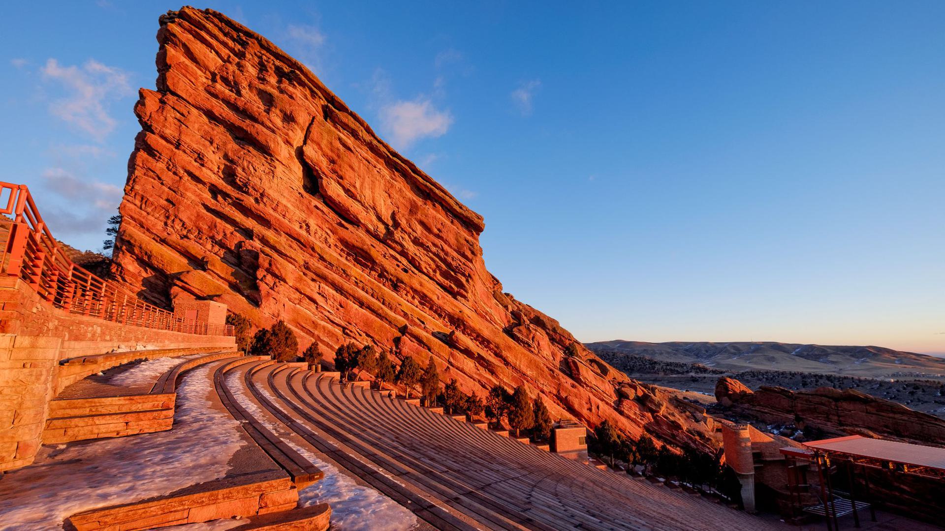 An amphitheater with a red tint