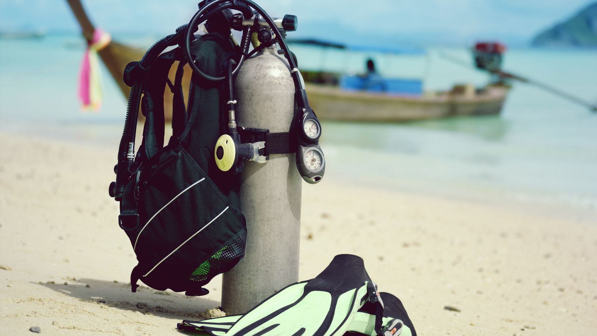 scuba equipment on a beach