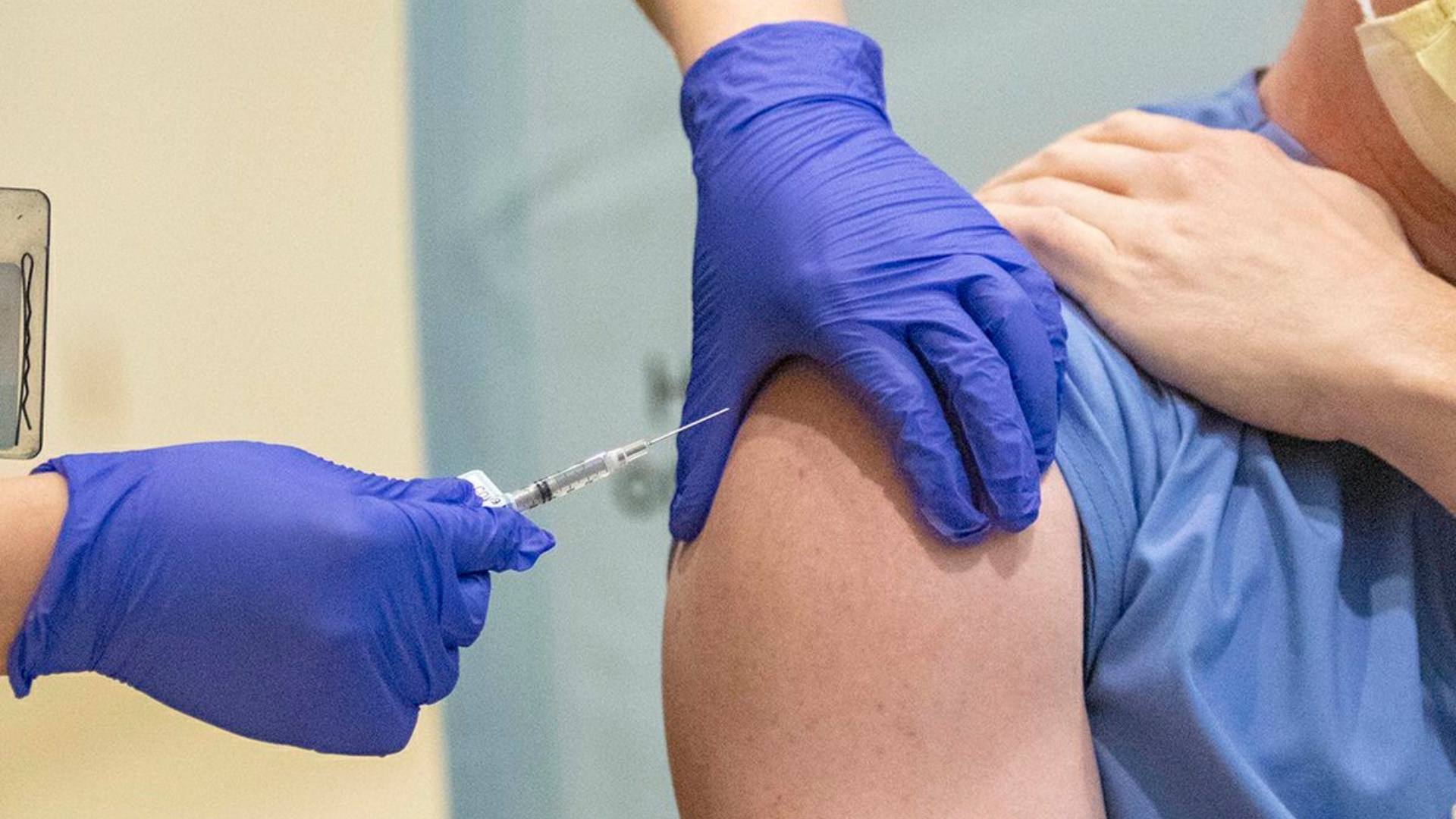 Photo of someone getting a shot.