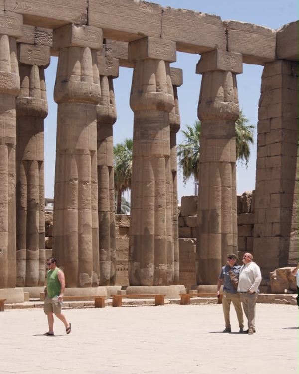 Photo of Scuba Jay and friend Fritz admiring the columns of the Luxor Temple.